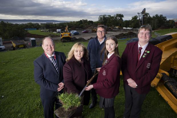 Photo of Education Minister Michelle McIlveen cutting the first sod on a new 700 pupil school for Ulidia Integrated College, Carrickfergus