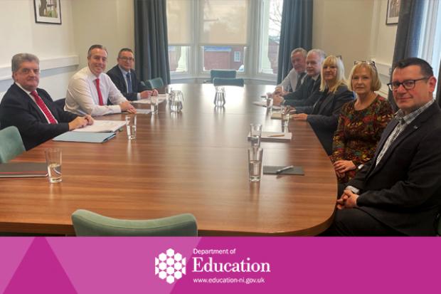 Picture of the Education Minister and DE officials meeting with representatives from the teaching unions.