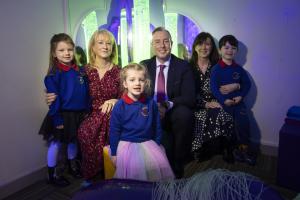Education Minister Paul Givan pictured in the sensory room at Holywood Nursery School with Principal, Clare Majury, Chair of the Board of Governors, Beverley Todd and pupils Alice, Emma and Joey.
